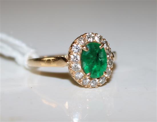 Emerald and diamond cluster ring